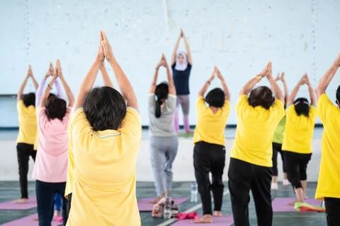 Elderly in a yoga exercise posture Foto stock