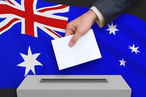 Election in Australia - voting at the ballot box. The hand of man is putting  库存插图