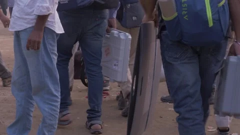 Election Commission of India officials with voting Compartment and EVMs, Bihar Stock Footage 327414328
