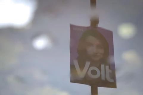 Election Poster reflection of the Volt party showing their top candidate Stock Photos