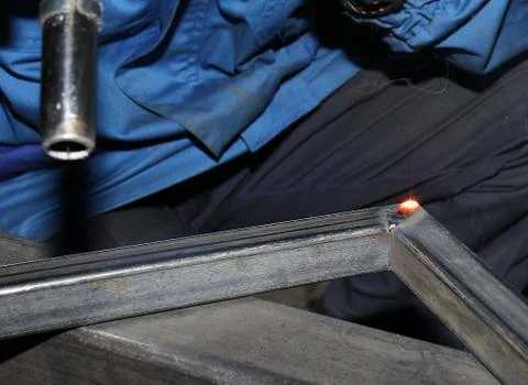 Electric arc welding. The corner cools down after welding. Stock Photos