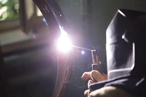 Electric arc welding, welding process, welding production, work of a welder Stock Photos