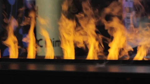 Electric artificial fireplace with orange fire flame interior Stock Footage 90490612