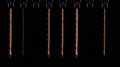 Electric background, retro light bulbs icicles. Black background. Stock-Footage 151088036