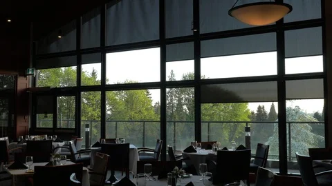 Electric blinds closing in a restaurant. Nice vew outside. Video stock 89519957