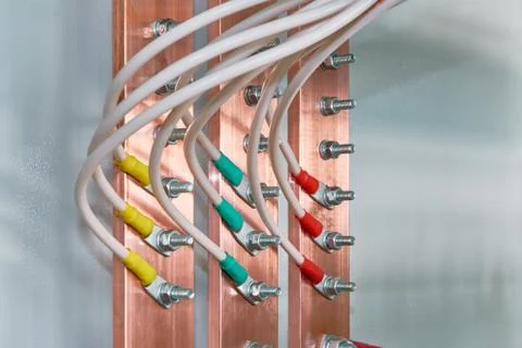 Electric bus bars connected to it by wires or cables. Stock Photos