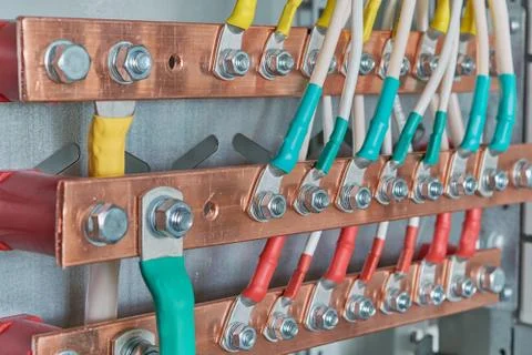 Electric bus bars connected to it by wires or cables. Stock Photos