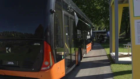 Electric Bus driving by Stock Footage 220009686