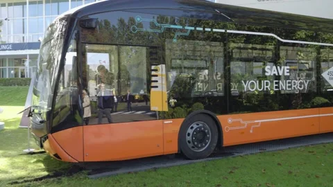 Electric Bus parking on gras Stock Footage 220009573