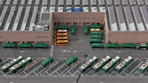 Electric Buses at Charging Stations in Milan Italy Aerial View 스톡 동영상 343378350