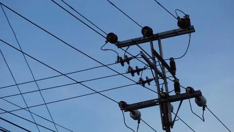 Electric cable network with a sky background Stock Photos