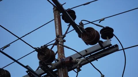 Electric cable network with a sky background Stock Photos