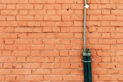 An electric cable in a protective casing Stock Photos