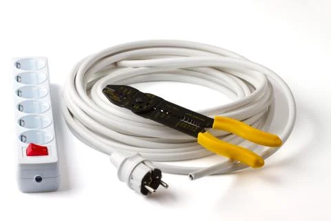 Electric cable, wire stripper, plug and socket Stock Photos