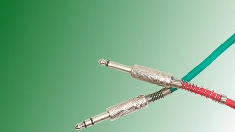 Electric cables with jacks on green gradient.Connection sound equipment Stock Illustration