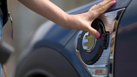 Electric car charging dock, plug in, stockvideo Stock Footage