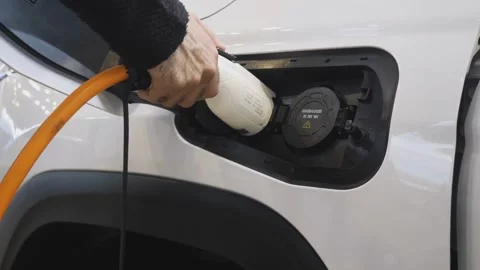 Electric Car Charging at Modern EV Station Sustainable Transport Concept Stock Footage 333367428