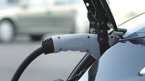 Electric car charging on the station Stock Footage