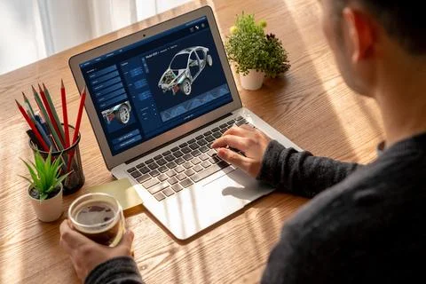 Electric car design software on computer screen show simulation blueprint snugly Foto stock