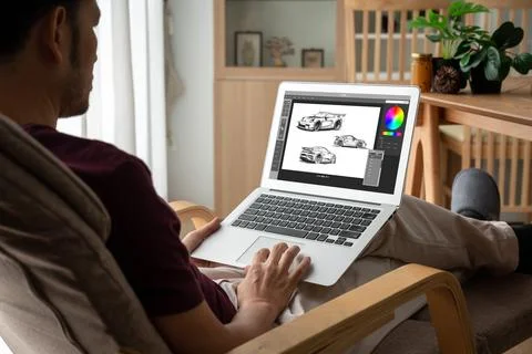 Electric car design software on computer screen show simulation blueprint snugly Foto stock