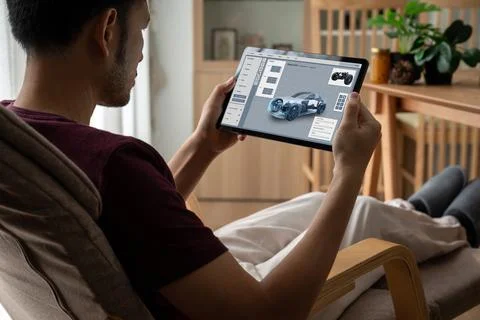 Electric car design software on computer screen show simulation blueprint snugly Foto stock