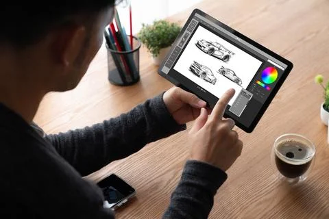 Electric car design software on computer screen show simulation blueprint snugly Foto stock