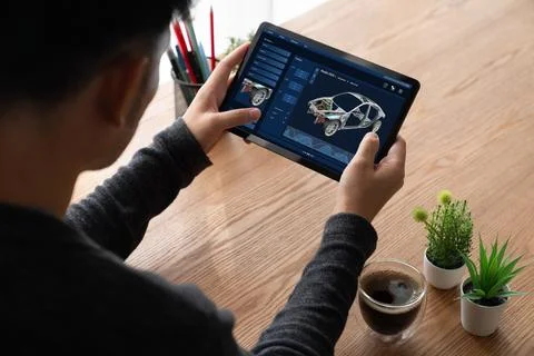Electric car design software on computer screen show simulation blueprint snugly Foto stock