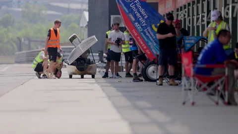 Electric Car at Pitstop of World Solar Challenge Darwin Race Track - Australia Stock Footage 263231661