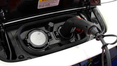 Electric Car Plugged In Charging. Stock Footage 88654151