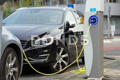 Electric Cars At Charging Station