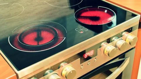 Electric ceramic stove inside the kitchen. Nice detail of a home appliance in 스톡 사진