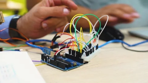 Electric circuit with colored wires connected to raspberry pi to control Stock Footage 163224159