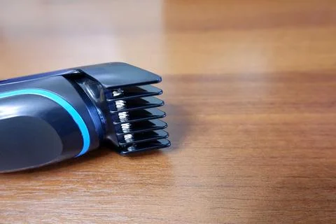 Electric clipper on the table close up Stock Photos