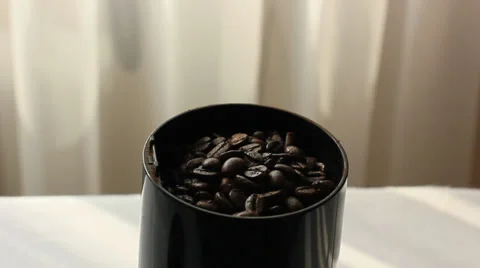 Electric coffee grinder working Stock Footage 30424264