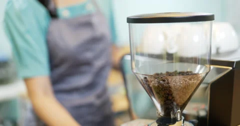 Electric coffee grinder working . Stock Footage 172343327