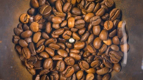 Electric coffee grinder works High angle view audio Stock Footage 101769879