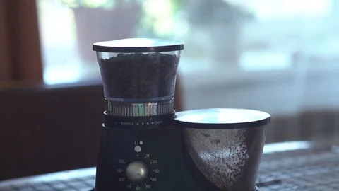 Electric coffee grinder works on the table. Video stock 93061824
