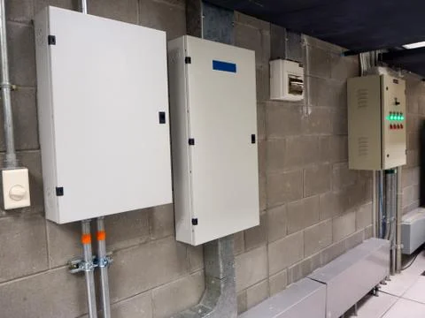 Electric control panel cabinets with the many color buttons for controller th Stock Photos