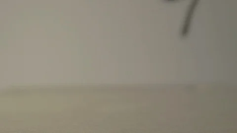 Electric cordless drill being put down in slow motion close up Video stock 103131198