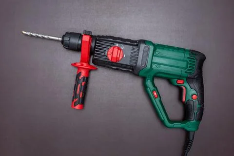 Electric drill on dark background Stock Photos