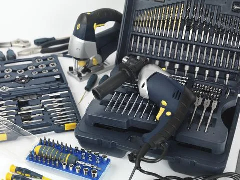 Electric drill, a jigsaw, thread cutting dies and taps, drill bits and other Stock Photos