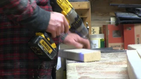 Electric Drill Using For Hole  In Rotten Wooden Board Stock-Footage 56261448