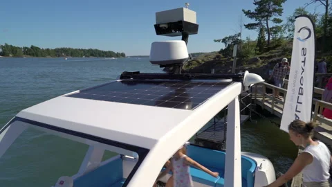 The electric, eco friendly, solar-powered and autonomous boat floating between Stock Footage 139039595