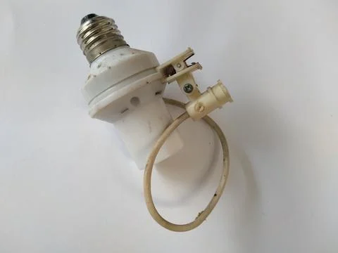 Electric element for lamp, isolated on the background Stock Photos