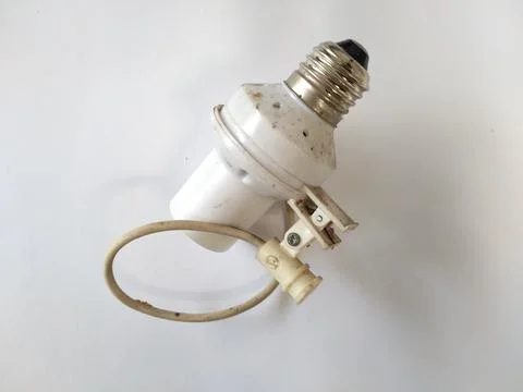 Electric element for lamp, isolated on the background. Stock Photos