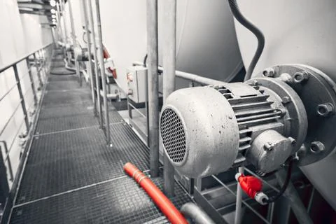 An electric engine a liquid on a container Stock Photos