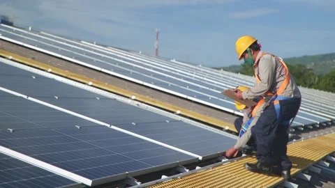 Electric engineer team inspecting and check solar cell system. Stock Footage 277105016