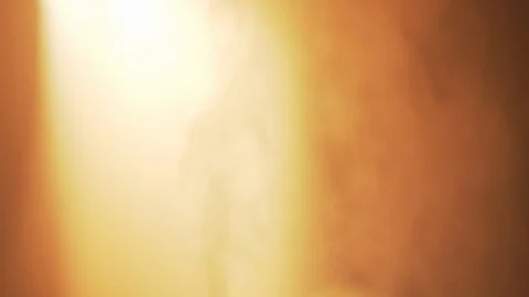 Electric essential oil diffuser steaming in living room, glowing in Stock Footage 127608358
