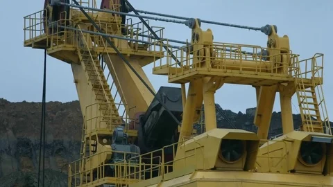 Electric excavator loads a mining dump truck Stock Footage 77235776