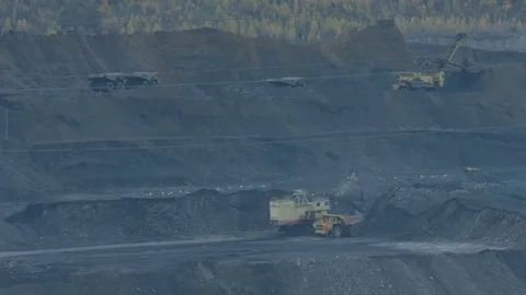 Electric excavator loads a mining dump truck Stock-Footage 77235789